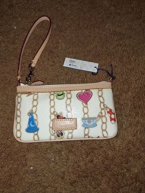 Dooney & Bourke Cream Wristlet with Multicolor Charm Print